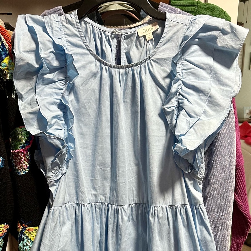 Boutique dress. NWT. size medium. Light blue with sequin shells and starfish!